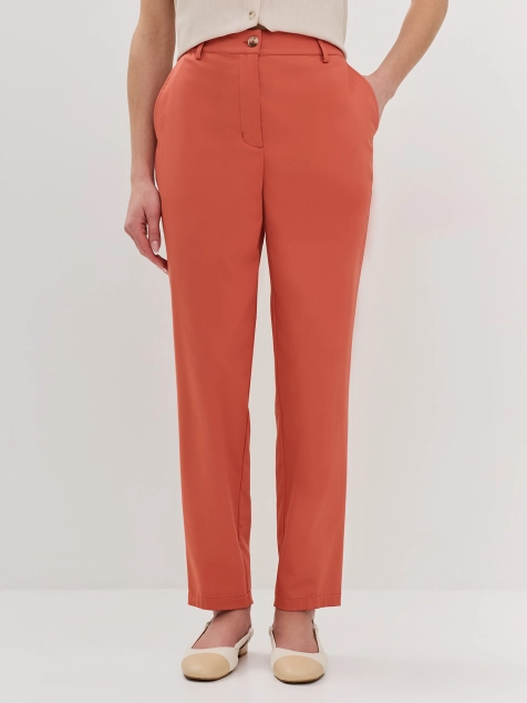 Яркие брюки в цвете терракот