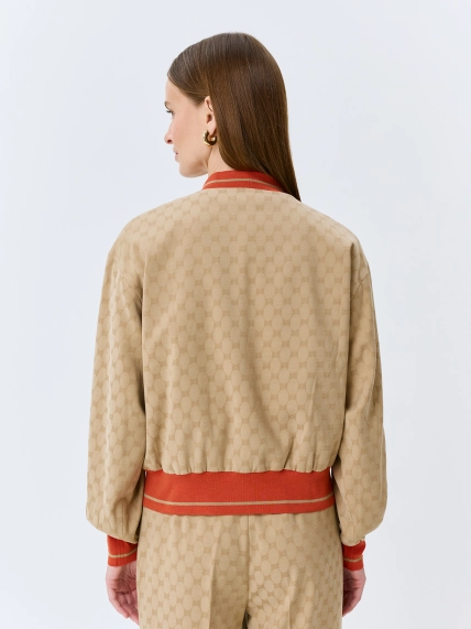 Бомбер из брендированного текстиля