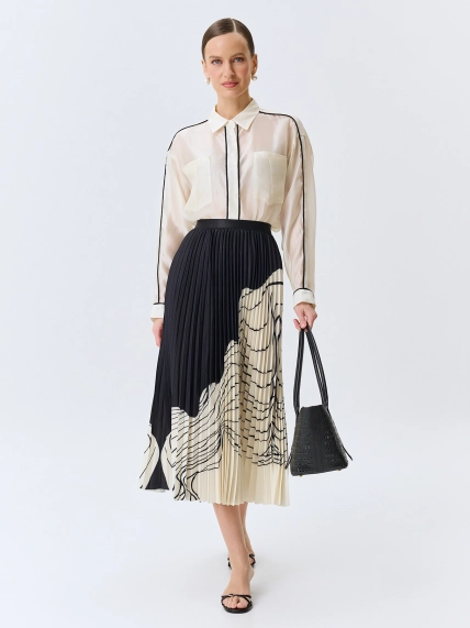 Полупрозрачная блузка с контрастными кантами