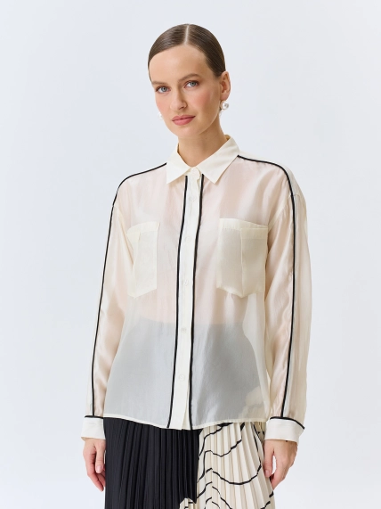 Полупрозрачная блузка с контрастными кантами