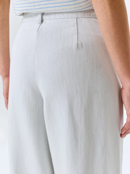 Фактурные джинсы-палаццо