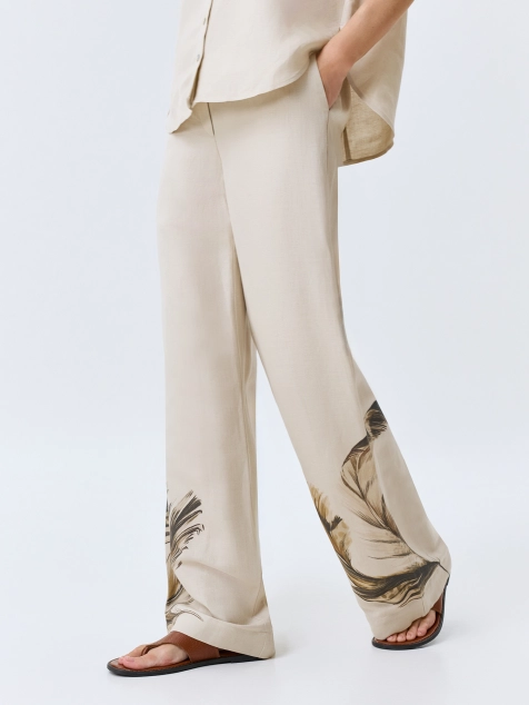 Льняные брюки с авторским принтом