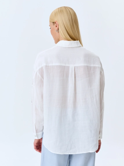 Полупрозрачная блузка с ажурной вышивкой