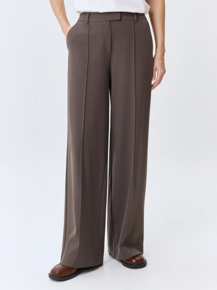 Брюки с застроченными стрелками