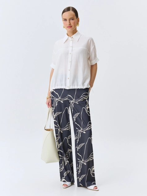 Брюки с абстрактным принтом