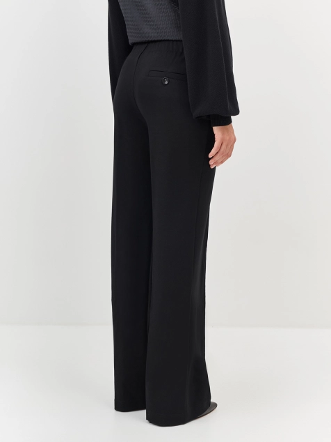 Брюки из джерси с акцентными пряжками