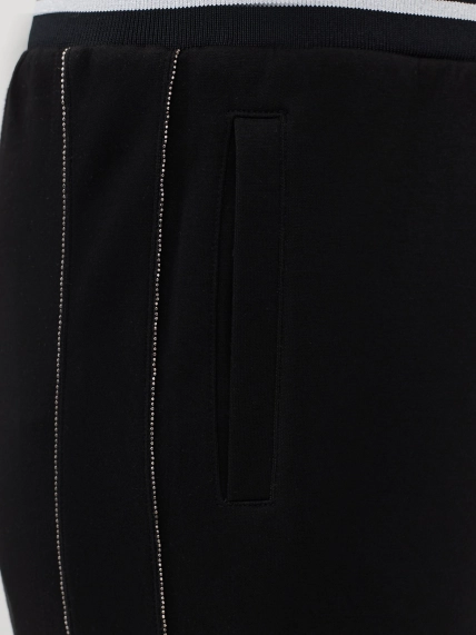 Трикотажные брюки с искрящимися лампасами