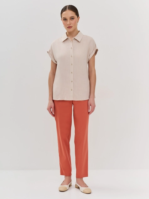 Яркие брюки в цвете терракот