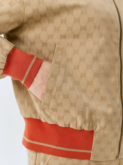 Бомбер из брендированного текстиля