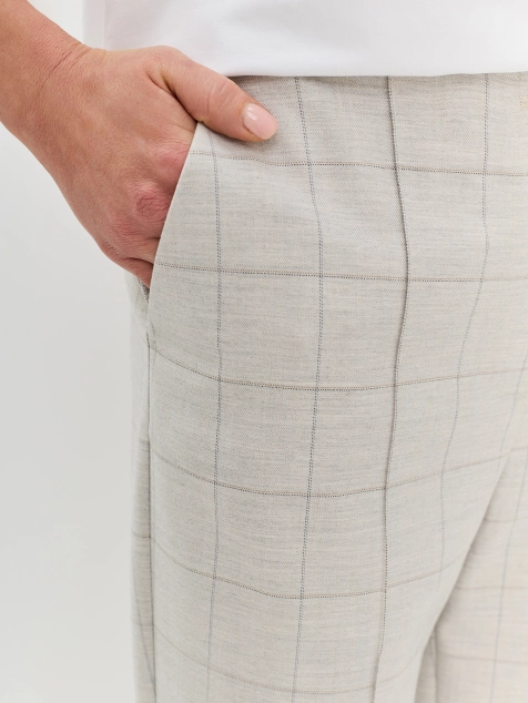 Брюки в клетку с застроченными стрелками