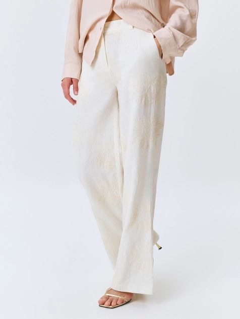 Льняные брюки с вышивкой