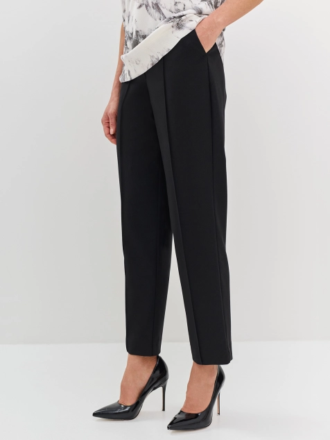 Классические брюки с застроченными стрелками