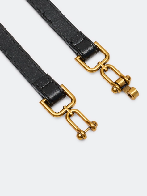 Узкий ремень с фигурной пряжкой