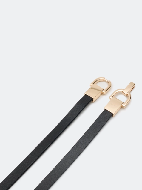 Узкий ремень с фигурной пряжкой