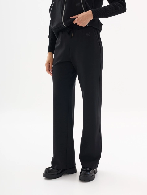 Трикотажные брюки в спортивном стиле