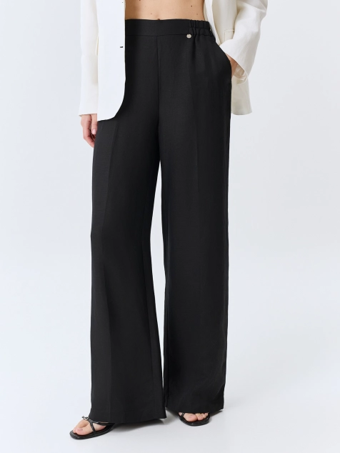 Льняные брюки с мягкими стрелками