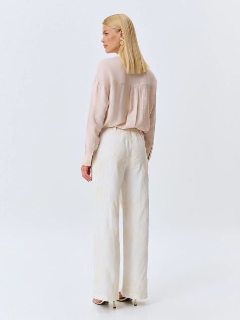 Льняные брюки с вышивкой