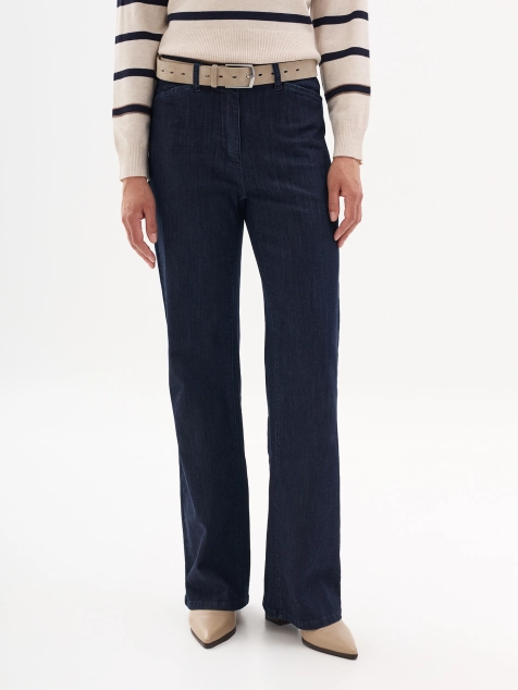 Свободные джинсы с декором на задних карманах