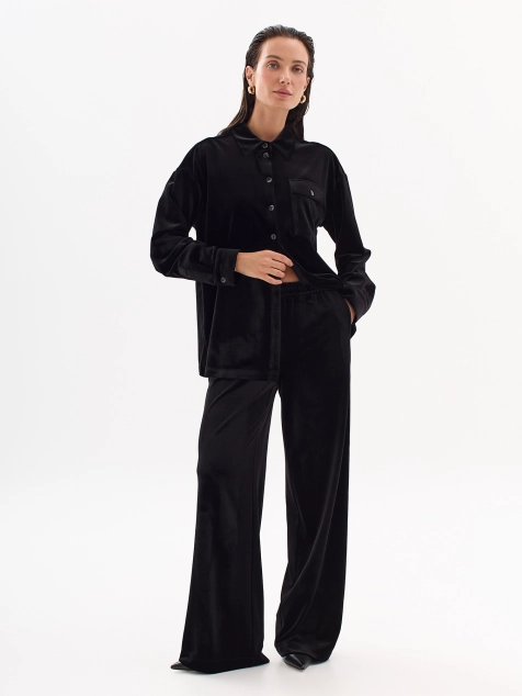 Бархатные брюки с серебристыми лампасами