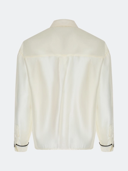 Полупрозрачная блузка с контрастными кантами