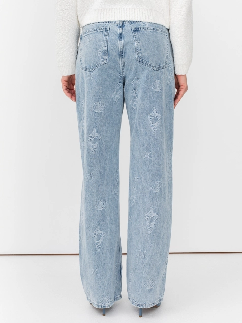 Джинсы из вышитого денима с морскими элементами