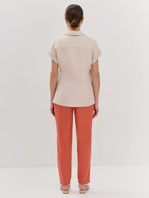 Яркие брюки в цвете терракот