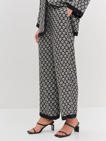 Брюки из 100% вискозы с геометрическим принтом